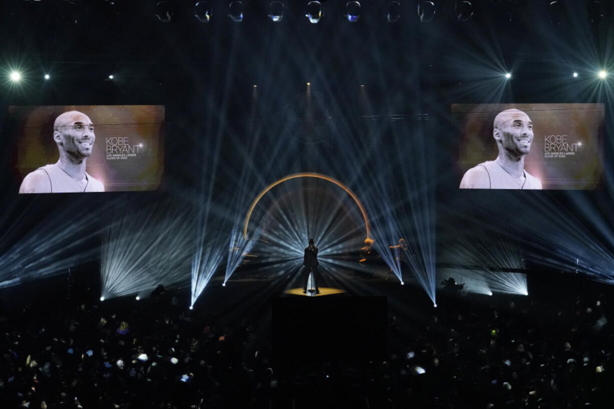 The late Kobe Bryant is honored, as are others who have died, as Ne-Yo sings "Incredible" during the 2020 Basketball Hall of Fame enshrinement ceremony Saturday, May 15, 2021, in Uncasville, Conn.