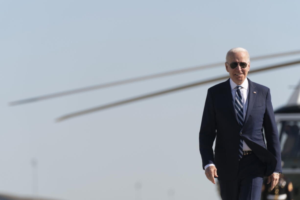 President Joe Biden arrives to board Air Force One at Andrews Air Force Base, Md., Wednesday, May 19, 2021. Biden is traveling to attend the commencement for the United States Coast Guard Academy in New London, Conn.