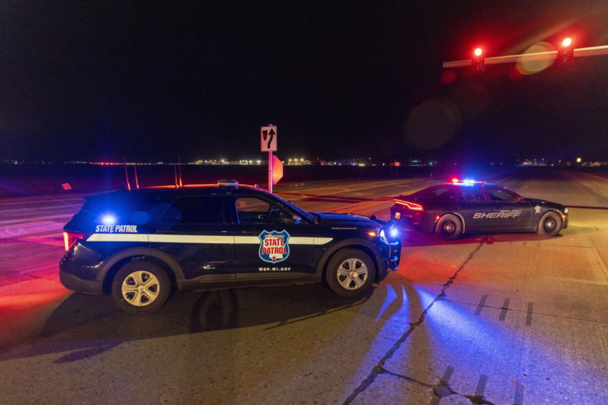 Law enforcement blocks the road in front of the Oneida Bingo and Casino in Green Bay, Wis on Saturday May 1, 2021 after reports of an active shooter. A spokesperson for a Wisconsin casino says an undetermined number of people have been shot at the casino. The Oneida Casino in Green Bay tweeted Saturday there was an active shooter at the casino.