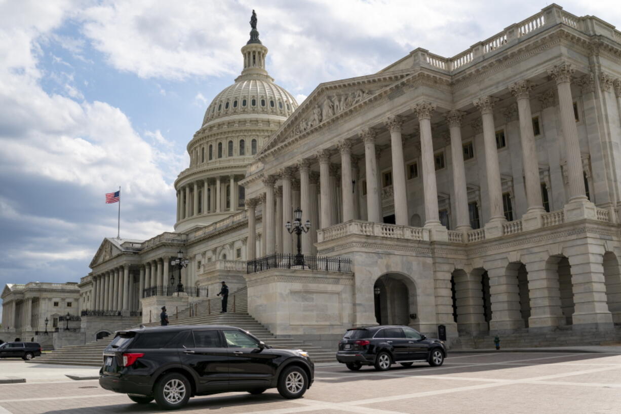 The Capitol is seen in Washington, Tuesday, May 11, 2021. House Minority Leader Kevin McCarthy, R-Calif., has set a Wednesday vote for removing Rep. Liz Cheney, R-Wyo., from her No. 3 Republican leadership post after Cheney repeatedly challenged former President Donald Trump over his claims of widespread voting fraud and his role in encouraging supporters' Jan. 6 attack on the Capitol. (AP Photo/J.