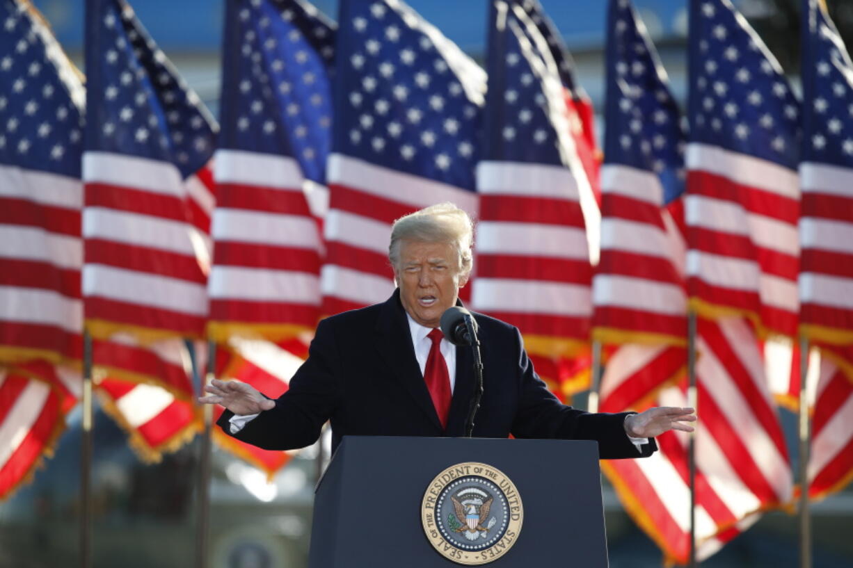 FILE - President Donald Trump speaks to crowd before boarding Air Force One at Andrews Air Force Base, Md., in this Wednesday, Jan. 20, 2021, file photo. Former President Donald Trump will find out this week whether he gets to return to Facebook. The social network's quasi-independent Oversight Board says it will announce its decision Wednesday, May 5 on a case concerning the former president. Trump's account was suspended for inciting violence that led to the deadly Jan. 6 Capitol riots. (AP Photo/Luis M.