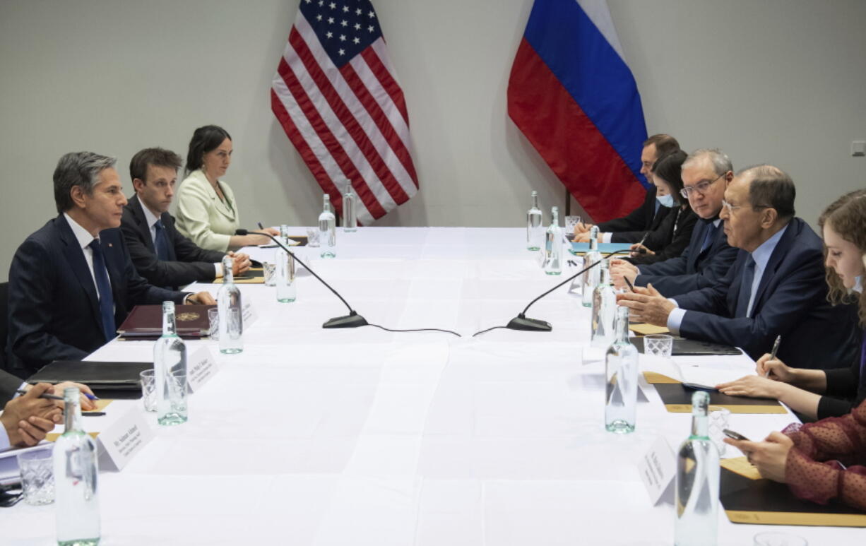 U.S. Secretary of State Antony Blinken, left, meets with Russian Foreign Minister Sergey Lavrov, right, at the Harpa Concert Hall in Reykjavik, Iceland, Wednesday, May 19, 2021, on the sidelines of the Arctic Council Ministerial summit.