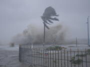 Heavy winds and sea waves hit the shore at the Digha beach on the Bay of Bengal coast as Cyclone Yaas intensifies in West Bengal state, India, Wednesday, May 26, 2021. Heavy rain and a high tide lashed parts of India's eastern coast as the cyclone pushed ashore Wednesday in an area where more than 1.1 million people have evacuated amid a devastating coronavirus surge.