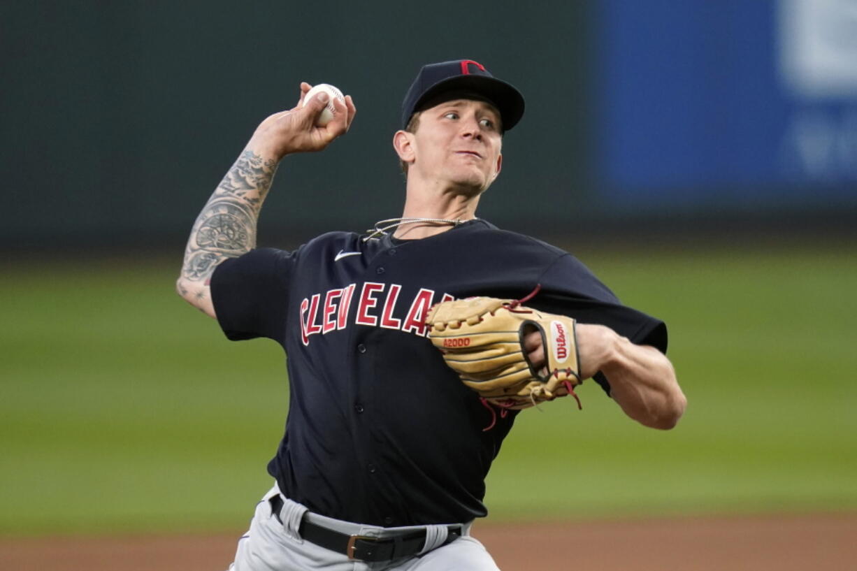 Cleveland Indians starting pitcher Zach Plesac throws to a Seattle Mariners batter during the fifth inning of a baseball game Thursday, May 13, 2021, in Seattle.