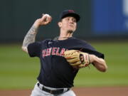 Cleveland Indians starting pitcher Zach Plesac throws to a Seattle Mariners batter during the fifth inning of a baseball game Thursday, May 13, 2021, in Seattle.