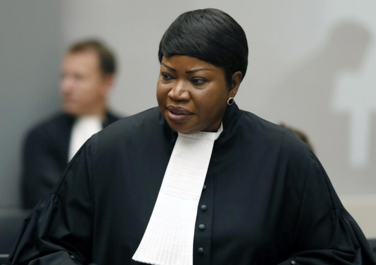 FILE - In this Tuesday Aug. 28, 2018 file photo, Prosecutor Fatou Bensouda at the International Criminal Court (ICC) in The Hague, Netherlands. The International Criminal Court Prosecutor opened a hearing Monday, May 24, 2021 of evidence against an alleged leader of a notorious militia blamed for atrocities in Darfur, calling him a "willing and energetic" perpetrator of crimes in the conflict-torn region of Sudan in 2003-2004. Fatou Bensouda was addressing judges at the start of the first presentation at the global court of evidence against a suspect charged with involvement in crimes by the Janjaweed militia in Darfur.