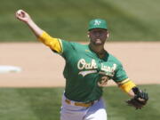 Oakland Athletics' James Kaprielian pitches against the Seattle Mariners during the seventh inning of a baseball game in Oakland, Calif., Wednesday, May 26, 2021.