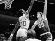 Mark Eaton (53), the 7-foot-4 shot-blocking king who twice was the NBA's defensive player of the year during his career with the Utah Jazz, has died, the team said Saturday, May 29, 2021. He was 64. (AP Photo/R.J.