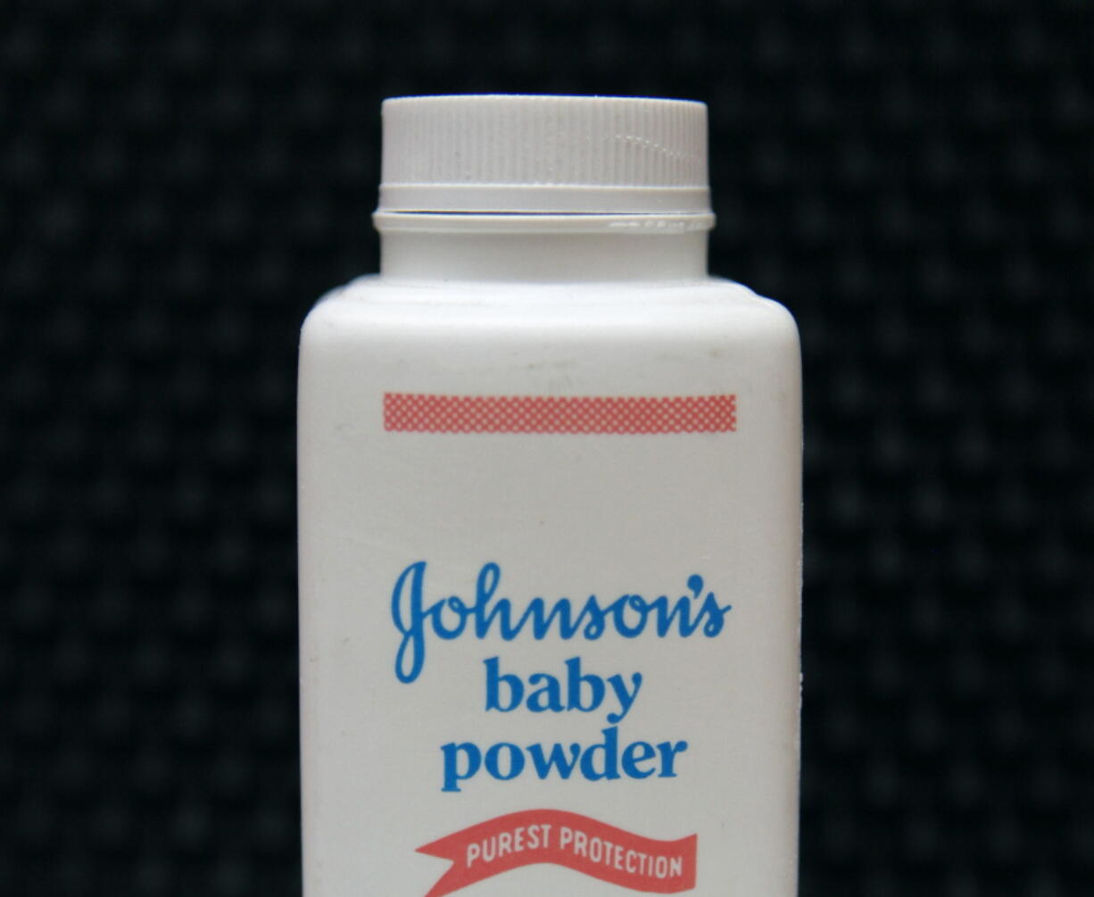 FILE - In this April 15, 2011, file photo, a bottle of Johnson's baby powder is displayed. Johnson & Johnson is asking for Supreme Court review of a $2 billion verdict in favor of women who claim they developed ovarian cancer from using the company's talc products.