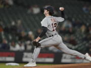 Detroit Tigers starting pitcher Casey Mize throws against the Seattle Mariners during the first inning of a baseball game, Monday, May 17, 2021, in Seattle. (AP Photo/Ted S.