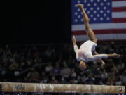 Simone Biles performs her balance beam routine during the U.S. Classic gymnastics competition in Indianapolis, Saturday, May 22, 2021.