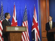 In this May 3, 2021, photo, Britain's Foreign Secretary Dominic Raab, right, and U.S. Secretary of State Antony Blinken speak at a news conference at Downing Street in London. A flurry of diplomatic activity and reports of major progress suggest that indirect talks between the U.S. and Iran may be nearing a conclusion. (Chris J.