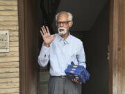 FILE - In this Nov. 8, 2020, file photo, Vice President Kamala Harris' maternal uncle, Balachandran Gopalan, talks to media outside his house, in New Delhi, India.