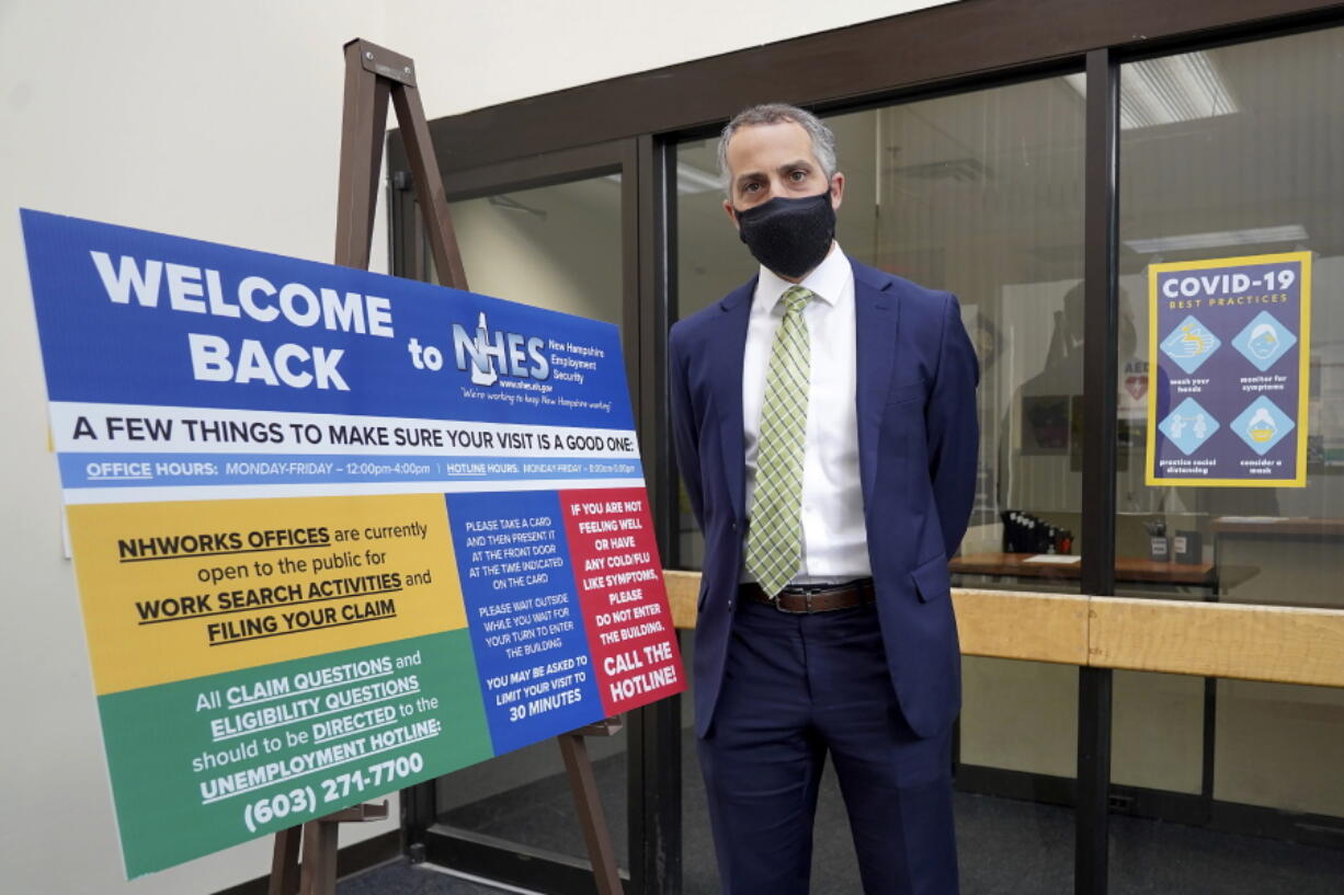 Richard Lavers, Deputy Commissioner New Hampshire Employment Security, poses for a photo at a New Hampshire Works employment security job center Monday, May 10, 2021, in Manchester, N.H. States are pushing the unemployed to get back to work to help businesses large and small find the workers they need to emerge from the COVID-19 recession.