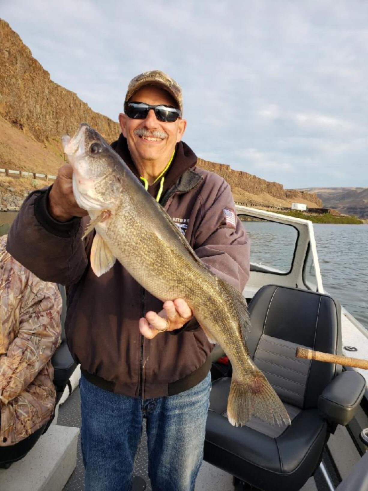 May and June are good months to catch walleye in the Columbia River Gorge. Here a client of guide Shane Magnuson poses with a dandy of a walleye caught last year.