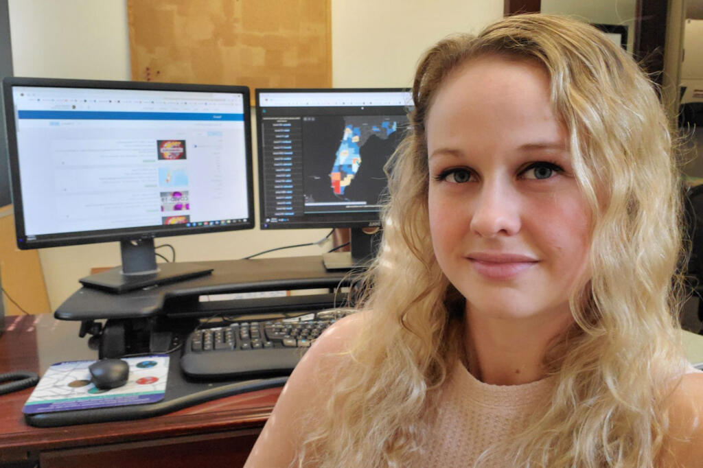 Rebekah Jones in her office at the Florida Department of Health. Jones has been granted whistleblower status in her ongoing battle over COVID-19 data in Florida.