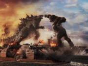 Godzilla battles Kong in Warner Bros. Pictures and Legendary Pictures' action adventure ???Godzilla vs. Kong.??? (Courtesy of Warner Bros.