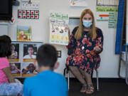 Kindergarten teacher Pam Younkin guides students on the appropriate voice levels for the classroom at Sifton Elementary School in September. Evergreen will expand summer school offerings to students in all grades, including 1,800 elementary students signed up for June and August summer school.