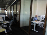 Vladimir Rakach, senior construction manager for Hurley Development, works in his office at Hurley Tower in downtown Vancouver.