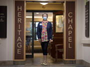 Marci Rau, who served as a chaplain at PeaceHealth Southwest Medical Center in Vancouver during the pandemic, pauses in the hospital's chapel. During the pandemic, Rau has had to find unique ways to connect patients and families during the dying process.