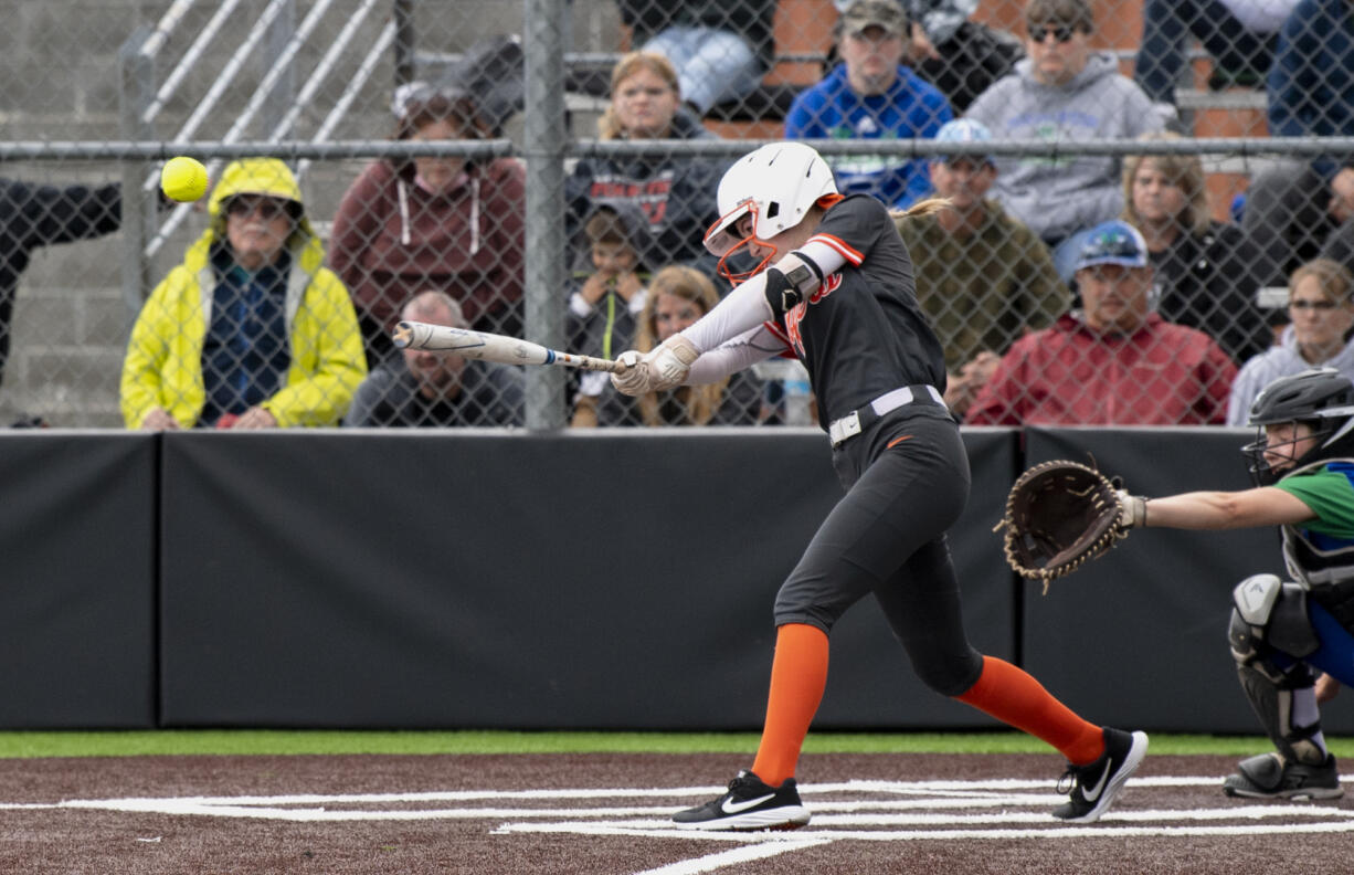 Battle Ground’s Hailey Ferguson connects on a line drive in the 4A/3A Greater St. Helens League district championship game on Saturday, June 5, 2021, at Camas High School. Battle Ground defeated Mountain View 8-0 to take the title.