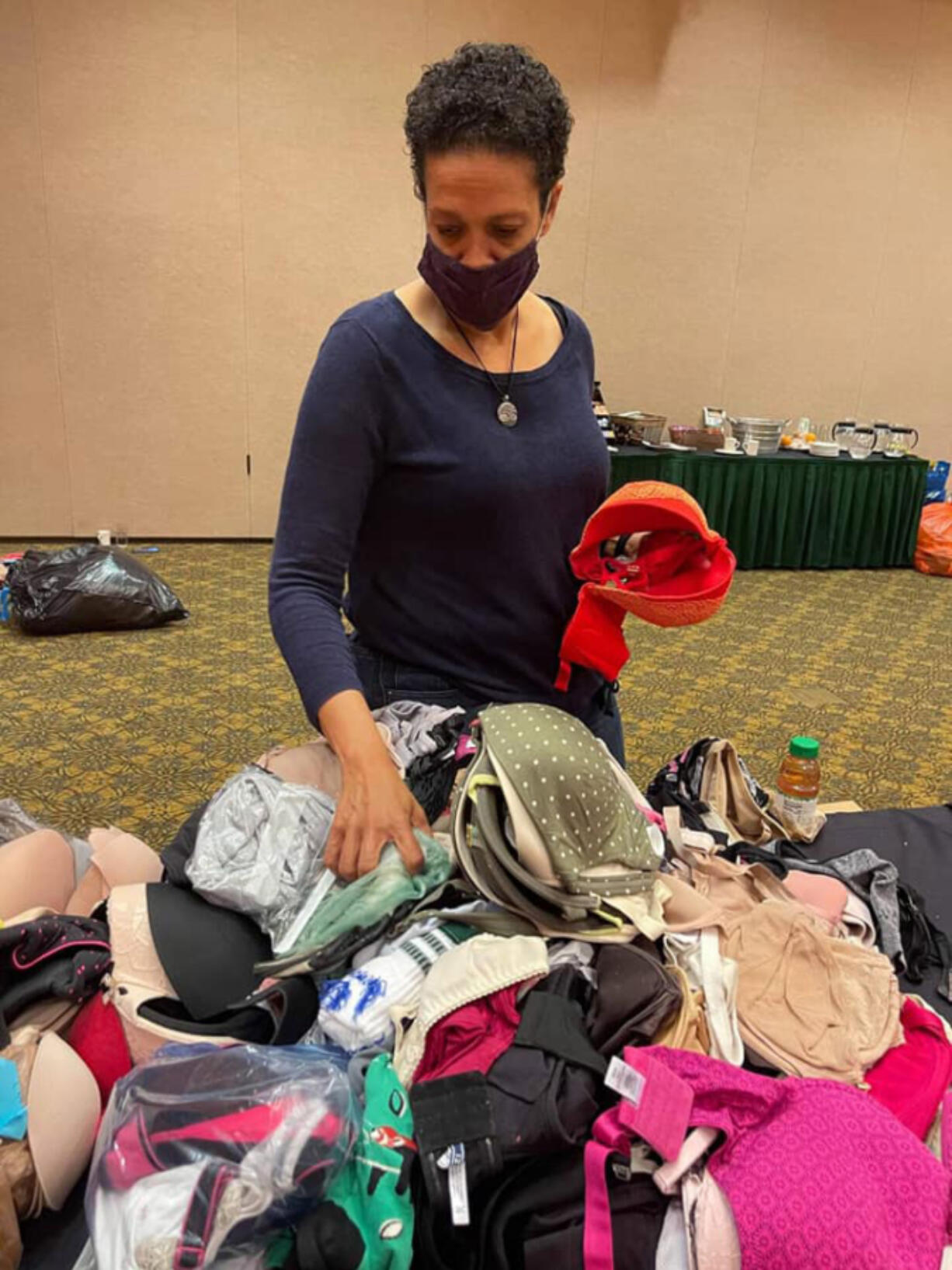 VAN MALL: Members from the National Women's Coalition Against Violence & Exploitation counted 8,700 bras for people in need at its first gathering in more than a year at The Heathman Lodge.