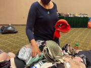 VAN MALL: Members from the National Women's Coalition Against Violence & Exploitation counted 8,700 bras for people in need at its first gathering in more than a year at The Heathman Lodge.