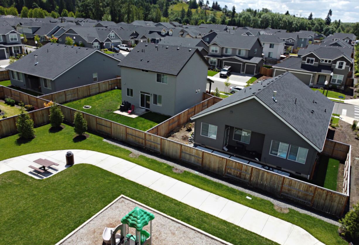 A children's playground and homes are pictured in a neighborhood in northeast Battle Ground on Wednesday morning. Infrastructure is at the top of the list of the city's draft housing action plan.