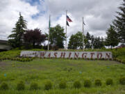 For the second year in a row, the "Welcome to Washington" display along Interstate 5 has not been replanted due to the COVID-19 pandemic. The garden is normally replanted with flowers each spring by volunteers from the Washington State University Extension Master Gardener program.