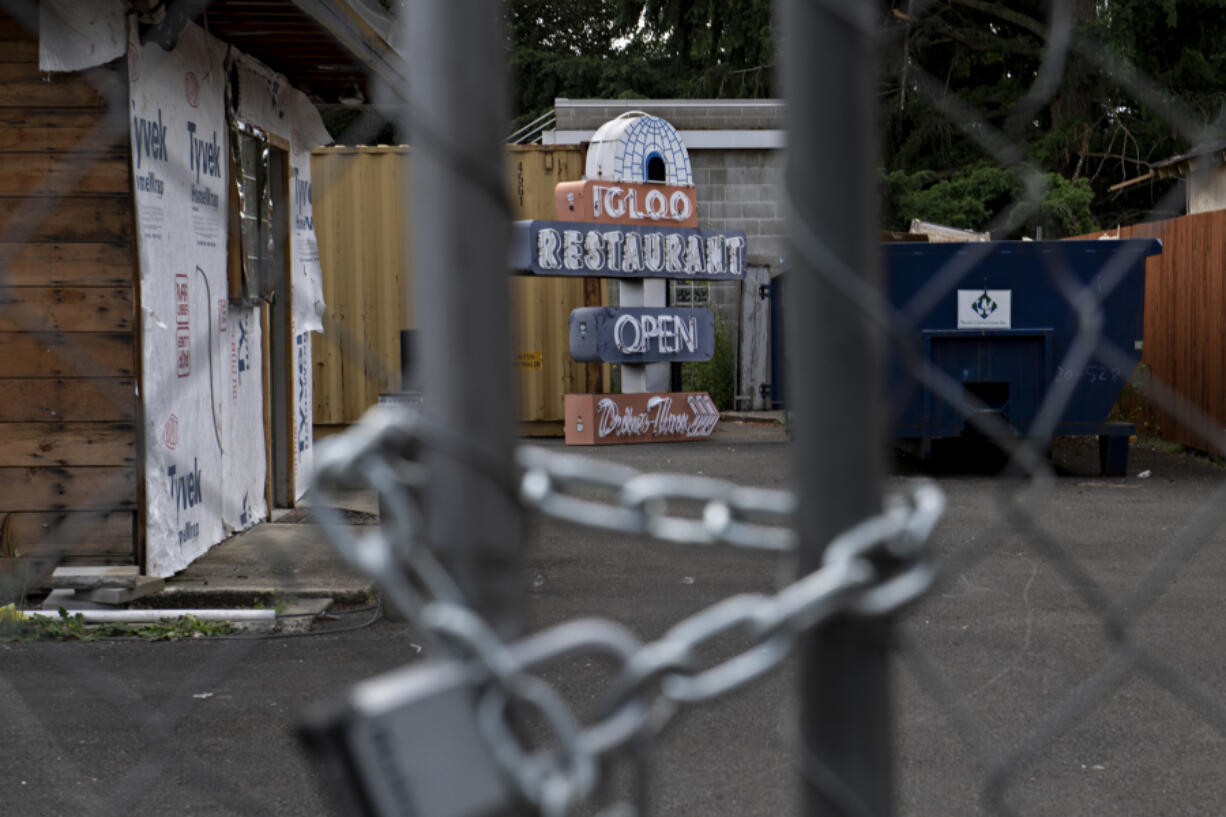 The sign for the former Igloo Restaurant is seen on the ground June 10. The Igloo, a vintage neighborhood diner, closed in 2018 but remained a landmark.