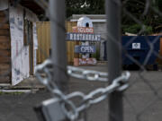 The sign for the former Igloo Restaurant is seen on the ground June 10. The Igloo, a vintage neighborhood diner, closed in 2018 but remained a landmark.