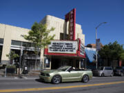 The Kiggins Theatre is open again to moviegoers, but it and similar businesses are counting on federal relief funds to help pay their bills.