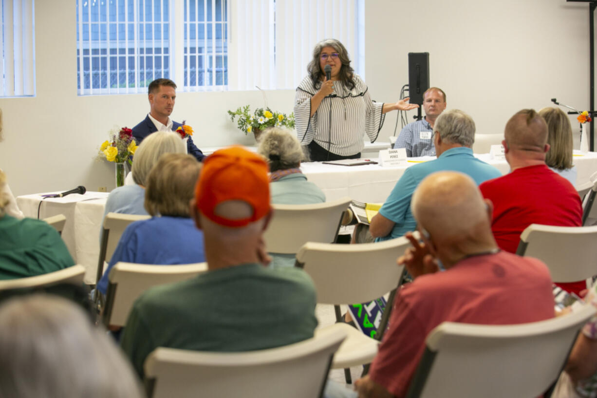 Diana Perez, candidate for Vancouver City Council Position 3, speaks during a candidate forum at Trinity Baptist Church in Vancouver on Tuesday. "I am running for city council because we need a fresh perspective," Perez said.