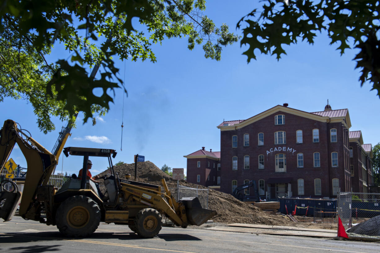 Construction has begun on the Aegis Phase 1 six-story apartment complex near the Providence Academy. Workers plan to construct a tower crane today.