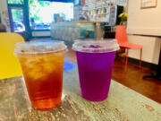 Iced orange passion fruit jasmine tea and butterfly pea flower tea with lemon juice at Dandelion Teahouse.