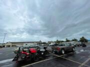 Residents in low-lying areas of Hancock County move their vehicles, lawn mowers, ATVs and boats to higher ground in Waveland, Miss., as a tropical system approaches Friday, June 18, 2021.  Forecasters predict a tropical system will bring heavy rain, storm surge and coastal flooding to the U.S. Gulf Coast. The poorly organized disturbance was located Friday morning about 255 miles south of Morgan City, Louisiana.