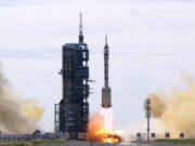 A Long March-2F Y12 rocket carrying a crew of Chinese astronauts in a Shenzhou-12 spaceship lifts off at the Jiuquan Satellite Launch Center in Jiuquan in northwestern China, Thursday, June 17, 2021. China has launched the first three-man crew to its new space station in its the ambitious programs first crewed mission in five years.