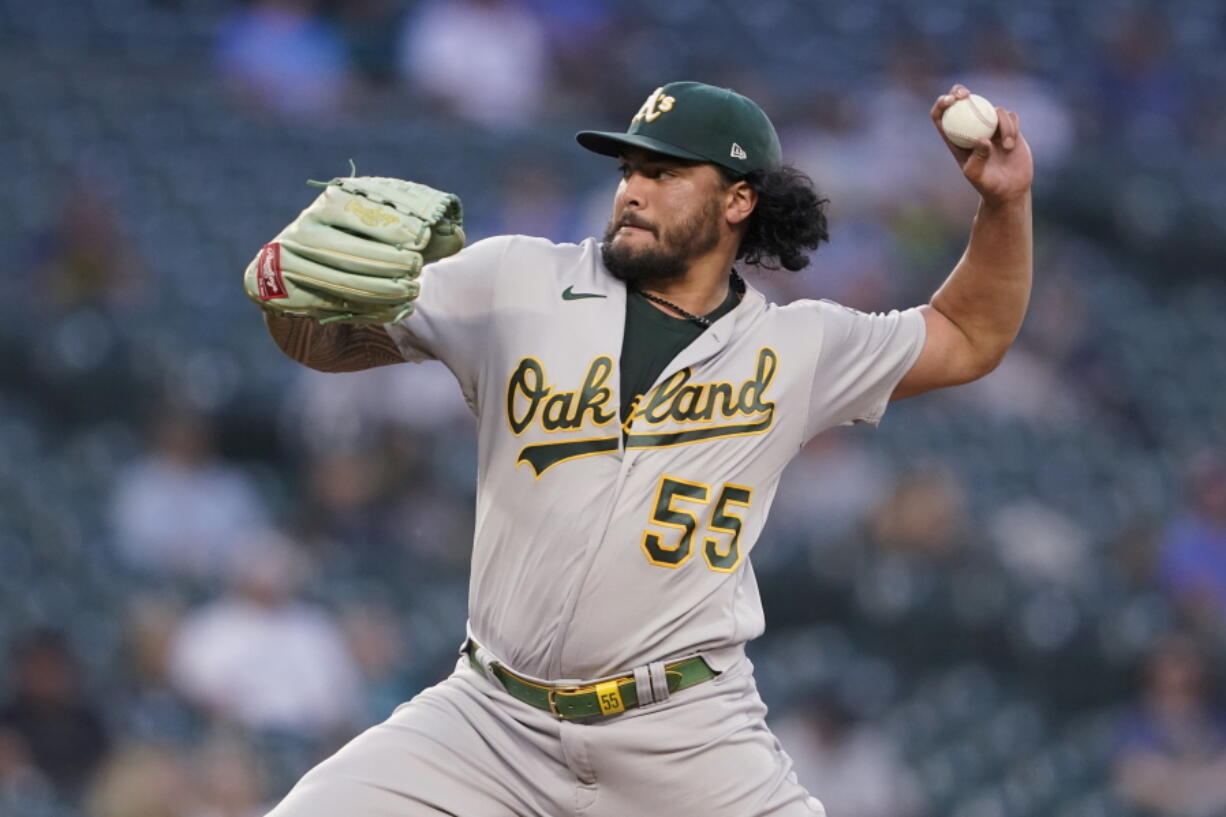 Oakland Athletics starting pitcher Sean Manaea throws to a Seattle Mariners batter during the fifth inning of a baseball game Wednesday, June 2, 2021, in Seattle. (AP Photo/Ted S.