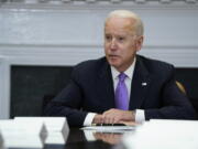 President Joe Biden speaks during a meeting with FEMA Administrator Deanne Criswell and Homeland Security Adviser and Deputy National Security Adviser Elizabeth Sherwood-Randall, in the Roosevelt Room of the White House, Tuesday, June 22, 2021, in Washington.