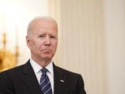 President Joe Biden listens as Attorney General Merrick Garland speaks during an event in the State Dining room of the White House in Washington, Wednesday, June 23, 2021, to discuss gun crime prevention strategy.