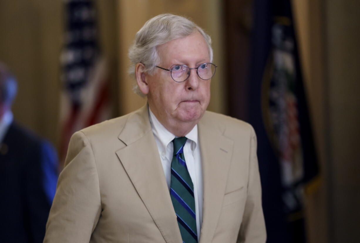 Senate Minority Leader Mitch McConnell, R-Ky., heads to the chamber to begin the week as Democrats try to advance President Joe Biden's legislative agenda, on Capitol Hill in Washington, Monday, June 21, 2021. (AP Photo/J.