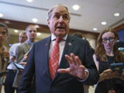 House Budget Committee Chairman John Yarmuth, D-Ky., pauses for reporters after meeting with the House Democratic Caucus and Biden administration officials to discuss progress on an infrastructure bill, at the Capitol in Washington, Tuesday, June 15, 2021. (AP Photo/J.