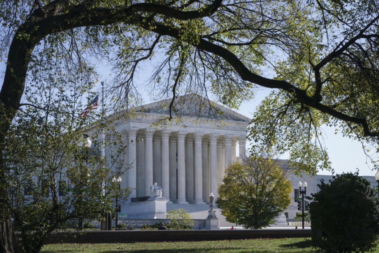 The Supreme Court is seen on Election Day, Tuesday, Nov. 3, 2020, in Washington. President Donald Trump says he's planning an aggressive legal strategy to try prevent Pennsylvania from counting mailed ballots that are received in the three days after the election, a matter that could find its way to the high court. (AP Photo/J.