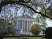 The Supreme Court is seen on Election Day, Tuesday, Nov. 3, 2020, in Washington. President Donald Trump says he's planning an aggressive legal strategy to try prevent Pennsylvania from counting mailed ballots that are received in the three days after the election, a matter that could find its way to the high court. (AP Photo/J.