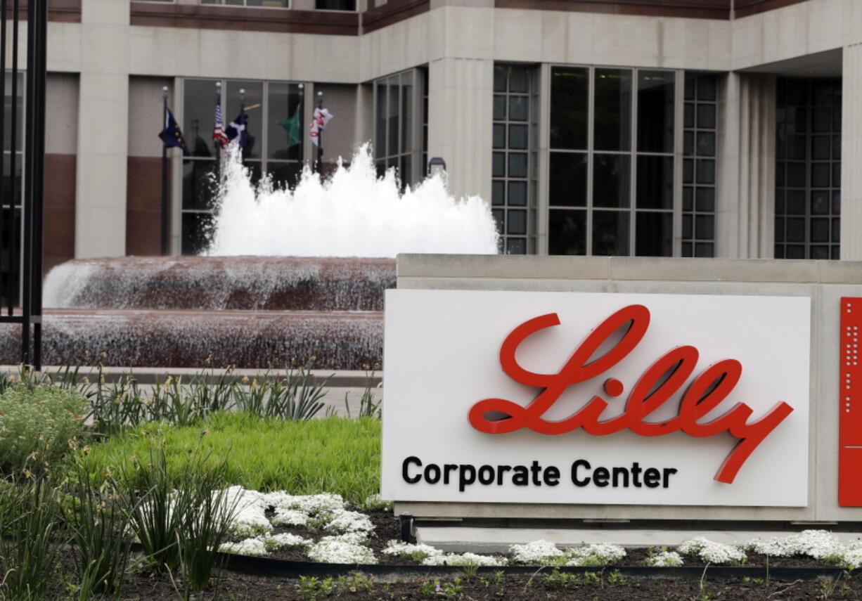 FILE- In this April 26, 2017, file photo shows the Eli Lilly and Co. corporate headquarters in Indianapolis. Shares of Eli Lilly and Co. jumped early Thursday, June 24, 2021,  after the drugmaker said it will seek approval for its potential Alzheimer's treatment later this year.