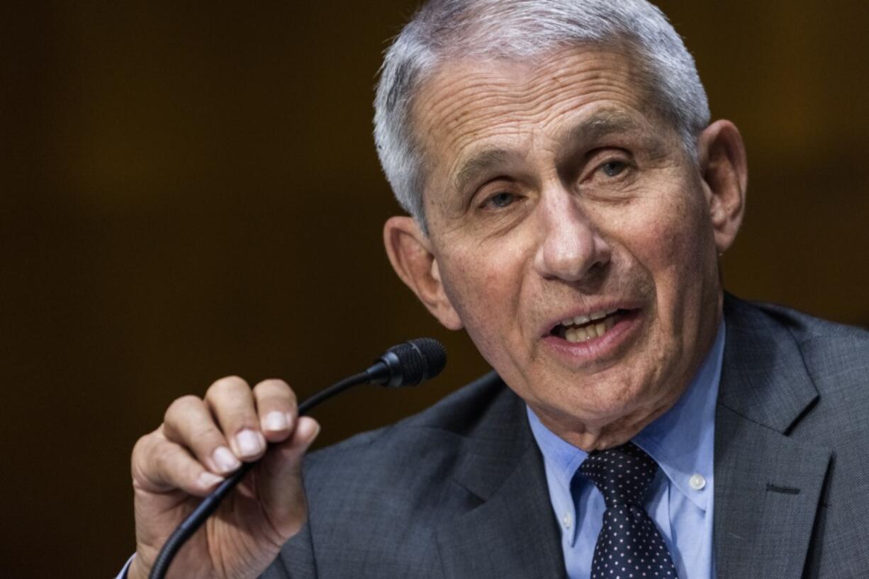 FILE - In this May 11, 2021, file photo, Dr. Anthony Fauci, director of the National Institute of Allergy and Infectious Diseases, speaks during hearing on Capitol Hill in Washington.  The United States is devoting more than $3 billion to advance development of antiviral pills for COVID-19, according to an official briefed on the matter.  The pills, which would be used to minimize symptoms after infection, are in development and could begin arriving by year's end, pending the completion of clinical trials.