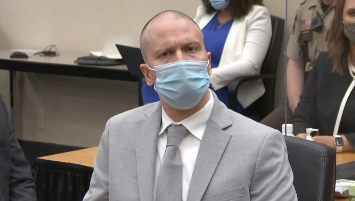 In this image taken from video, former Minneapolis police Officer Derek Chauvin listens as Hennepin County Judge Peter Cahill sentences him to 22 1/2 years in prison, Friday, June 25, 2021, for the May 25, 2020, death of George Floyd,  at the Hennepin County Courthouse in Minneapolis.