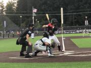 Ridgefield Raptors outfielder Tafton Hensley bats against the Bellingham Bells on Tuesday at Ridgefield Outdoor Recreation Complex.