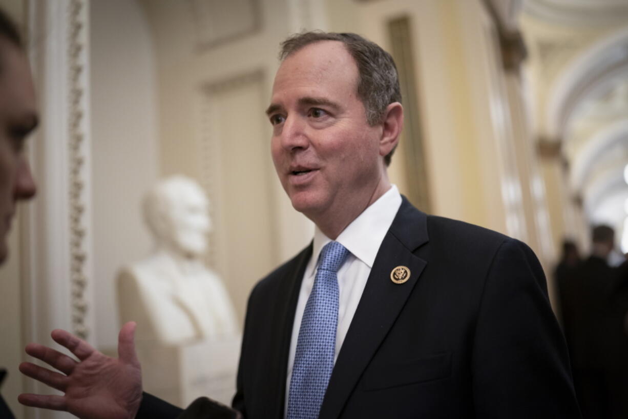 FILE - In this Tuesday, March 3, 2020, file photo, House Intelligence Committee Chairman Adam Schiff, D-Calif., talks to reporters as lawmakers work to extend government surveillance powers that are expiring soon, on Capitol Hill in Washington. House Speaker Nancy Pelosi and other top Democrats called for an investigation on Thursday, June 10, 2021, after The New York Times reported that the Justice Department under President Donald Trump seized the communications data of members of the House Intelligence Committee, including those of Schiff. (AP Photo/J.