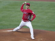 Los Angeles Angels starting pitcher Shohei Ohtani (17) throws during the first inning of a baseball game against the Seattle Mariners Friday, June 4, 2021, in Anaheim, Calif.